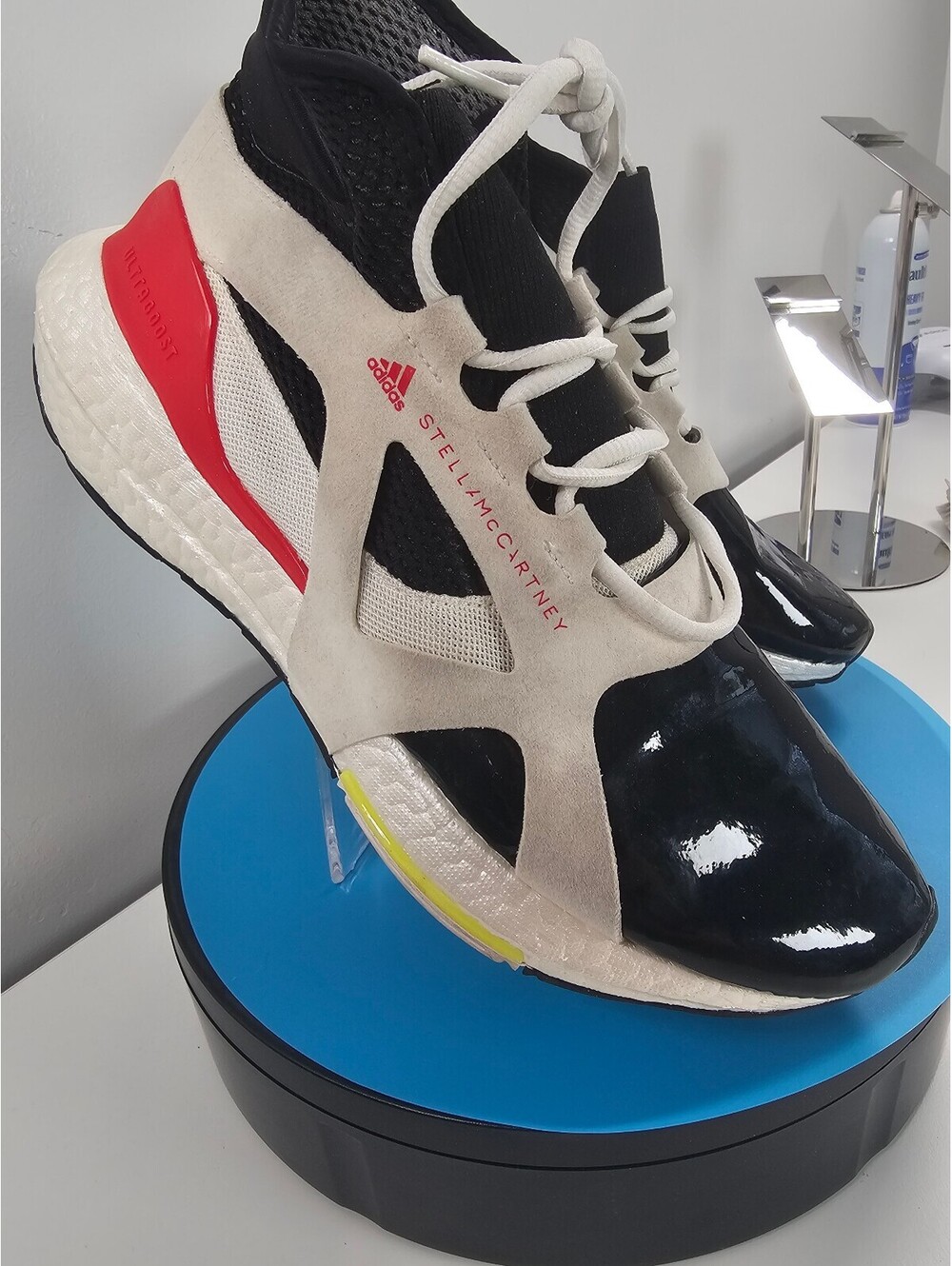 adidas by Stella McCartney Ultraboost 21 in the "White / Core Black / Vivid Red